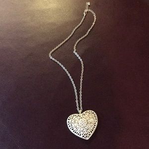 Gold caged heart pendant necklace